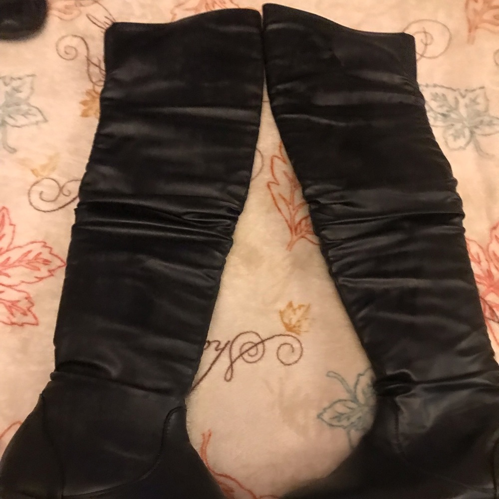 Black thigh high boots
